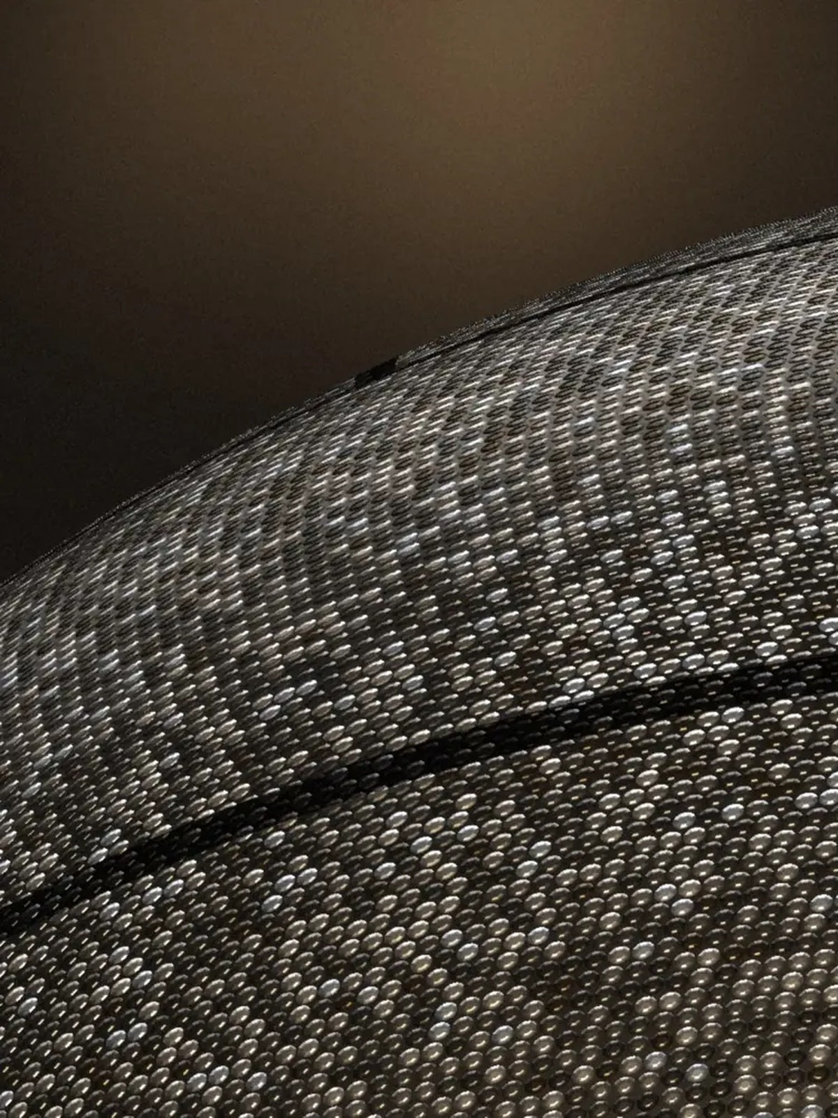 Close-up of rhinestones meeting at a seam on a Blizazz soccer ball